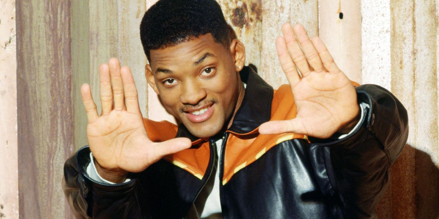 Will Smith, posing with his hands up