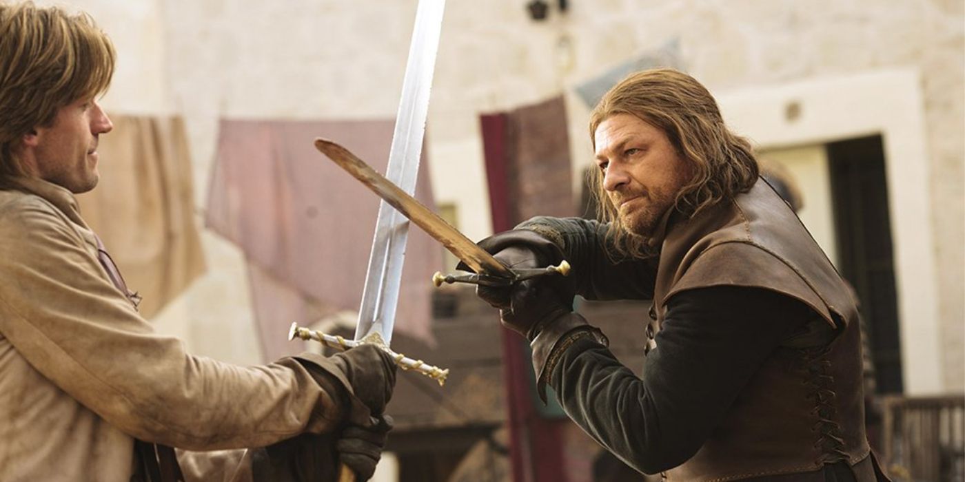 Eddard Stark (Sean Bean) crosses swords with Jaime Lannister (Nikolaj Coster-Waldau) in the streets of King's Landing.
