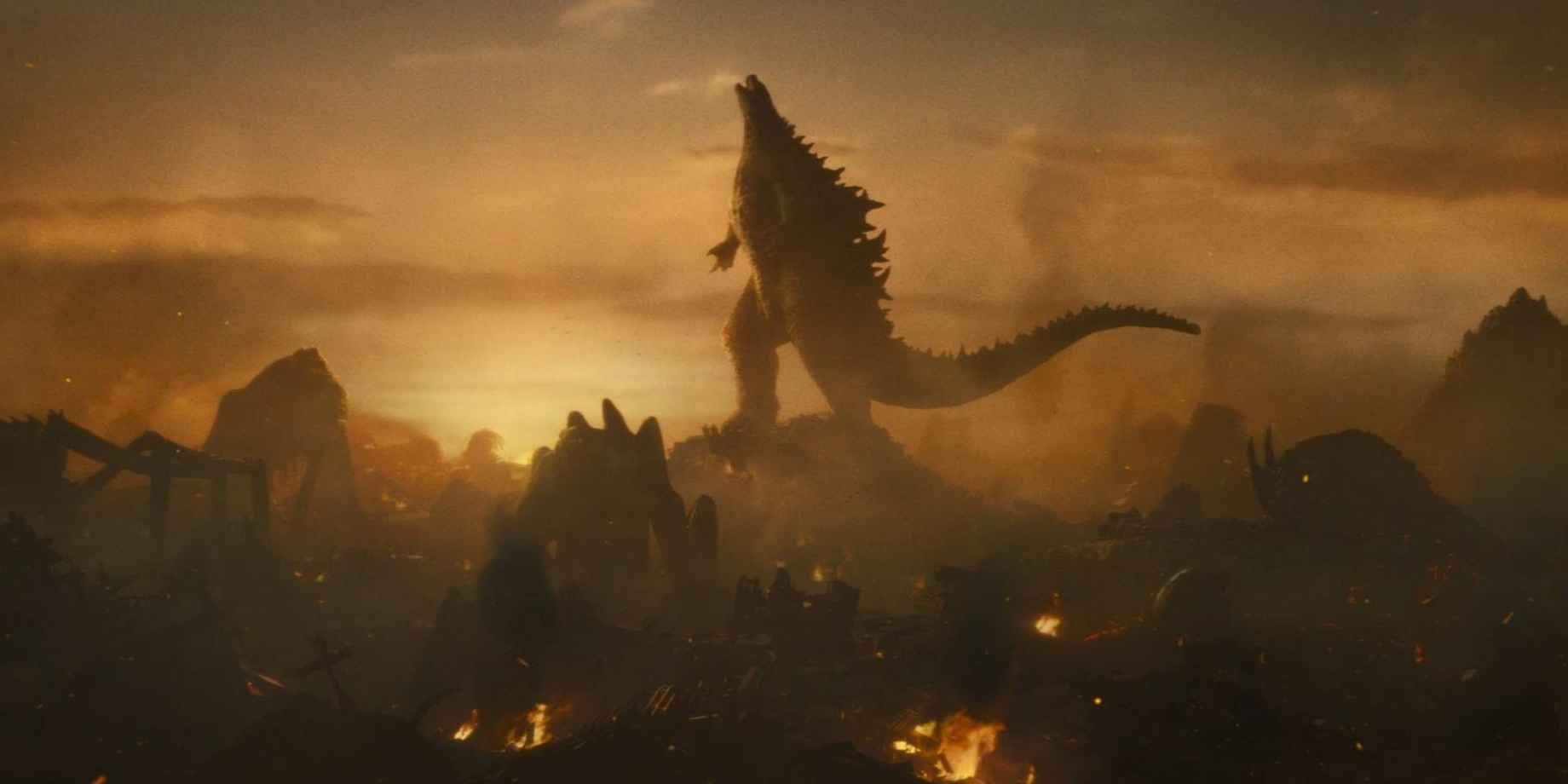 Godzilla roars into the sky while several Titans (including Scylla, Rodan, and a MUTO) bow to him. 