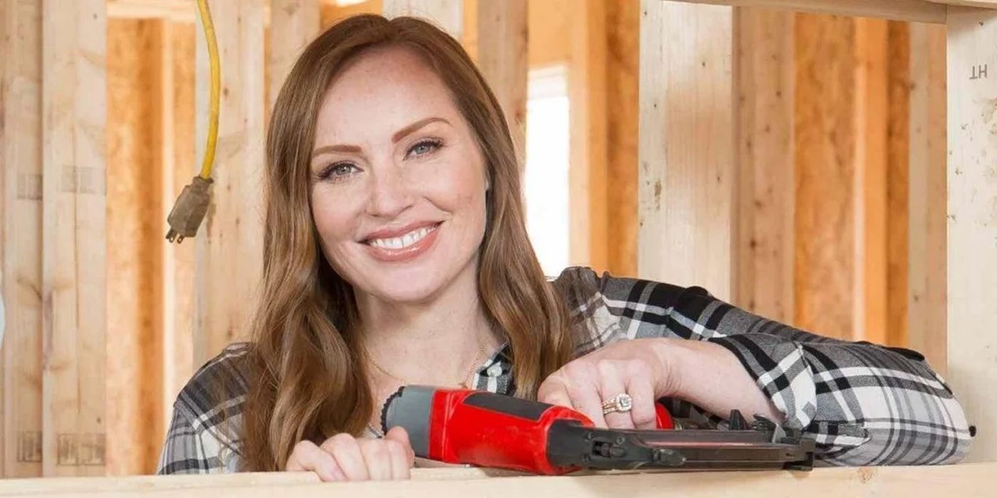 Mina Starsiak Hawk smiling while posing with a drill in a promotional image for Good Bones.