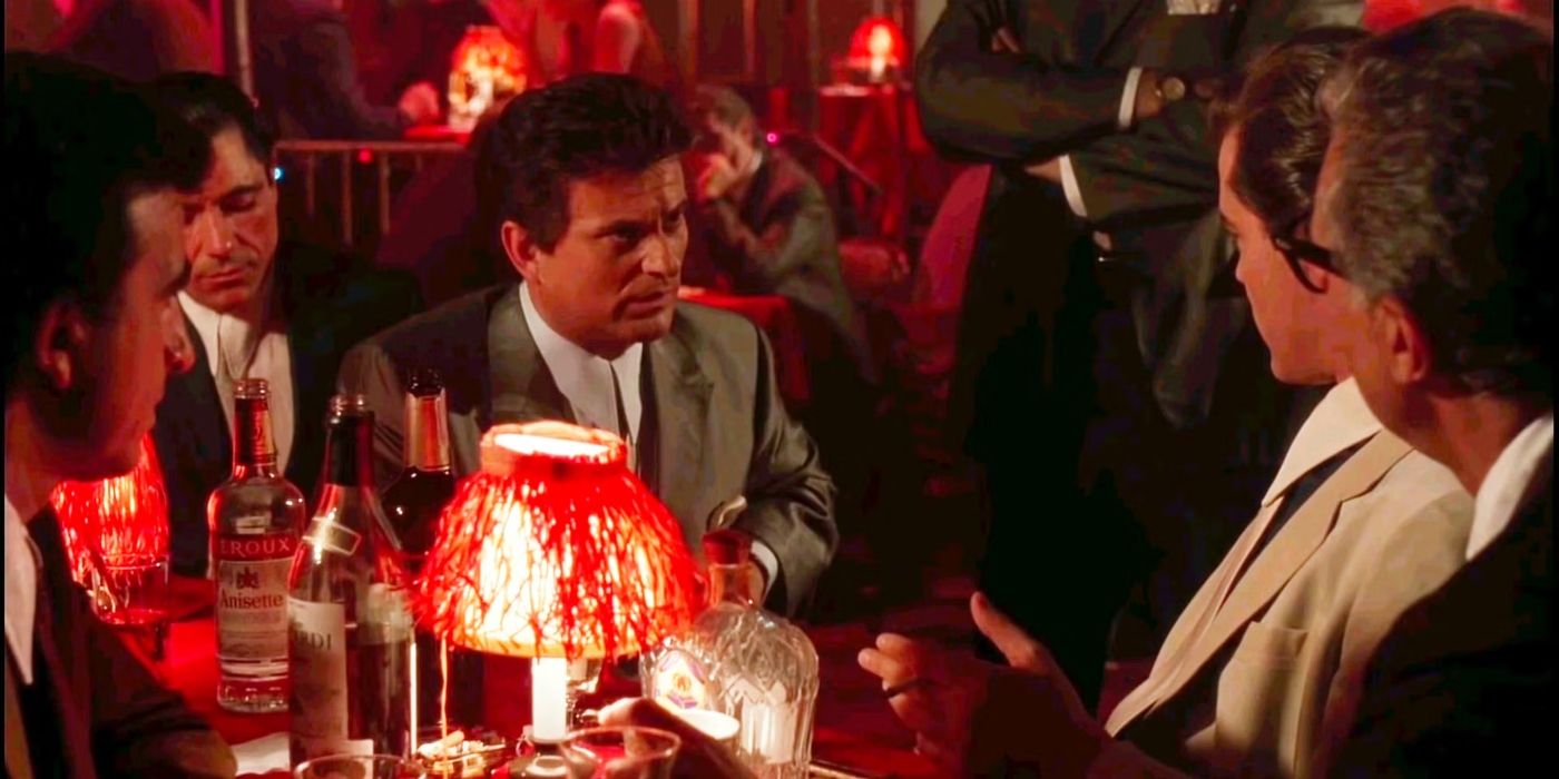 Tommy DeVito talking to Henry Hill at a bar in Goodfellas