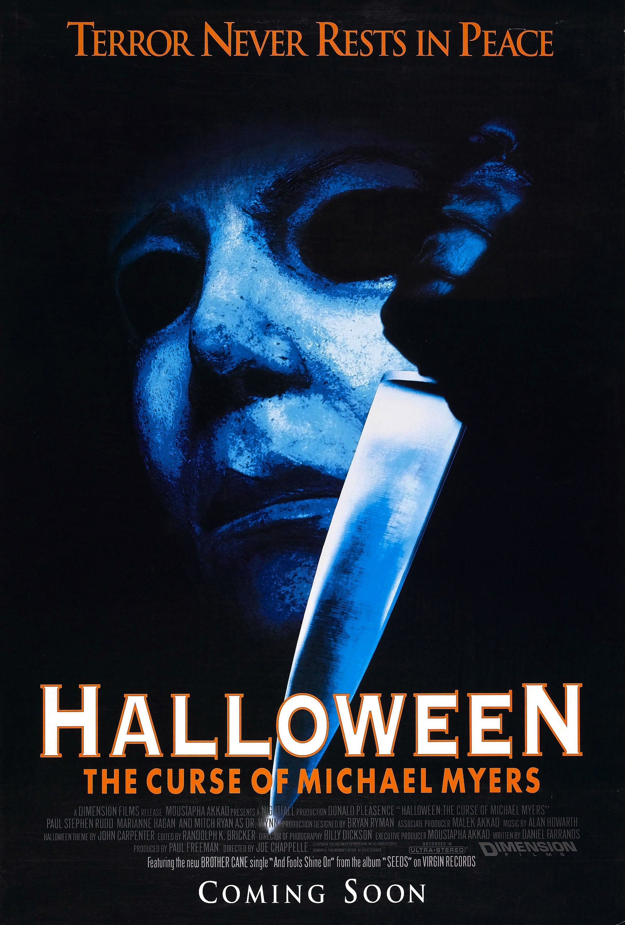 Close-up of Michael Myers holding up a knife in the poster for Halloween: The Curse of Michael Myers