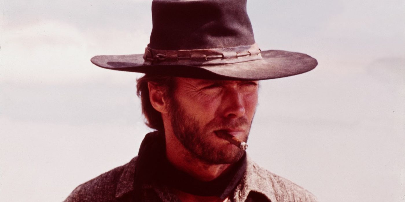 Clint Eastwood smoking and looking off into the distance in High Plains Drifter