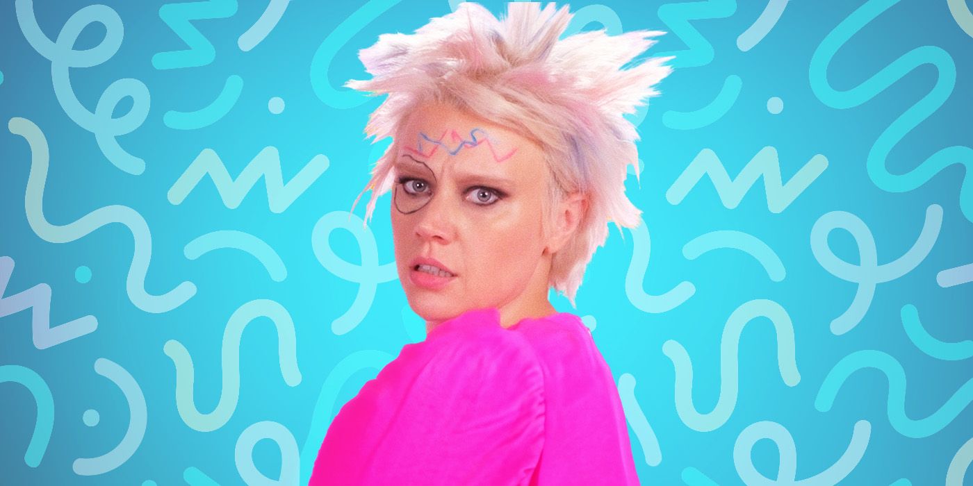 Kate McKinnon as Weird Barbie from Greta Gerwig's Barbie, superimposed in front of a virbrant blue background