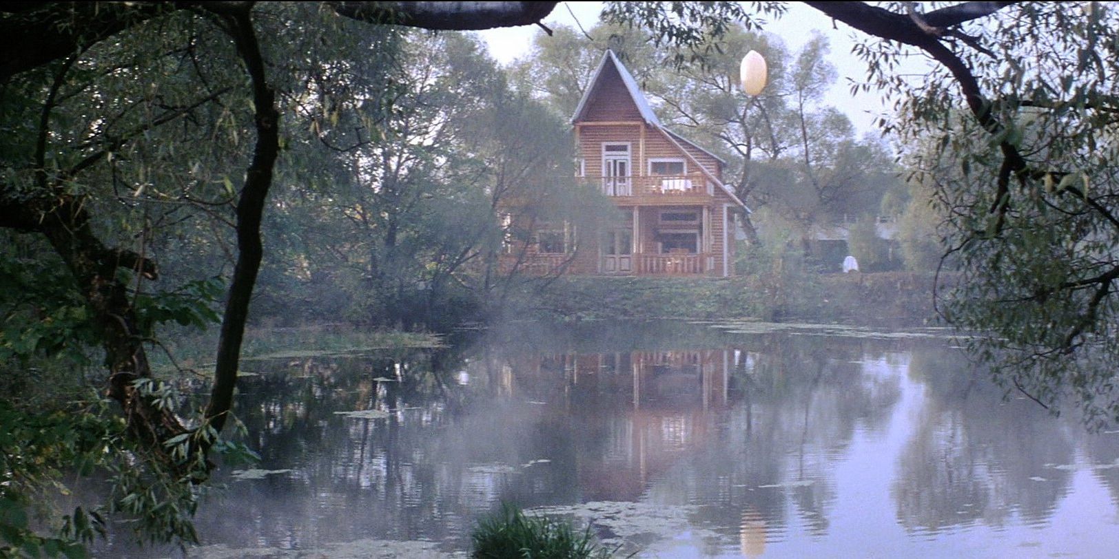 A wood house by a misty swamp in Andrei Tarkovsky&rsquo;s Solaris.