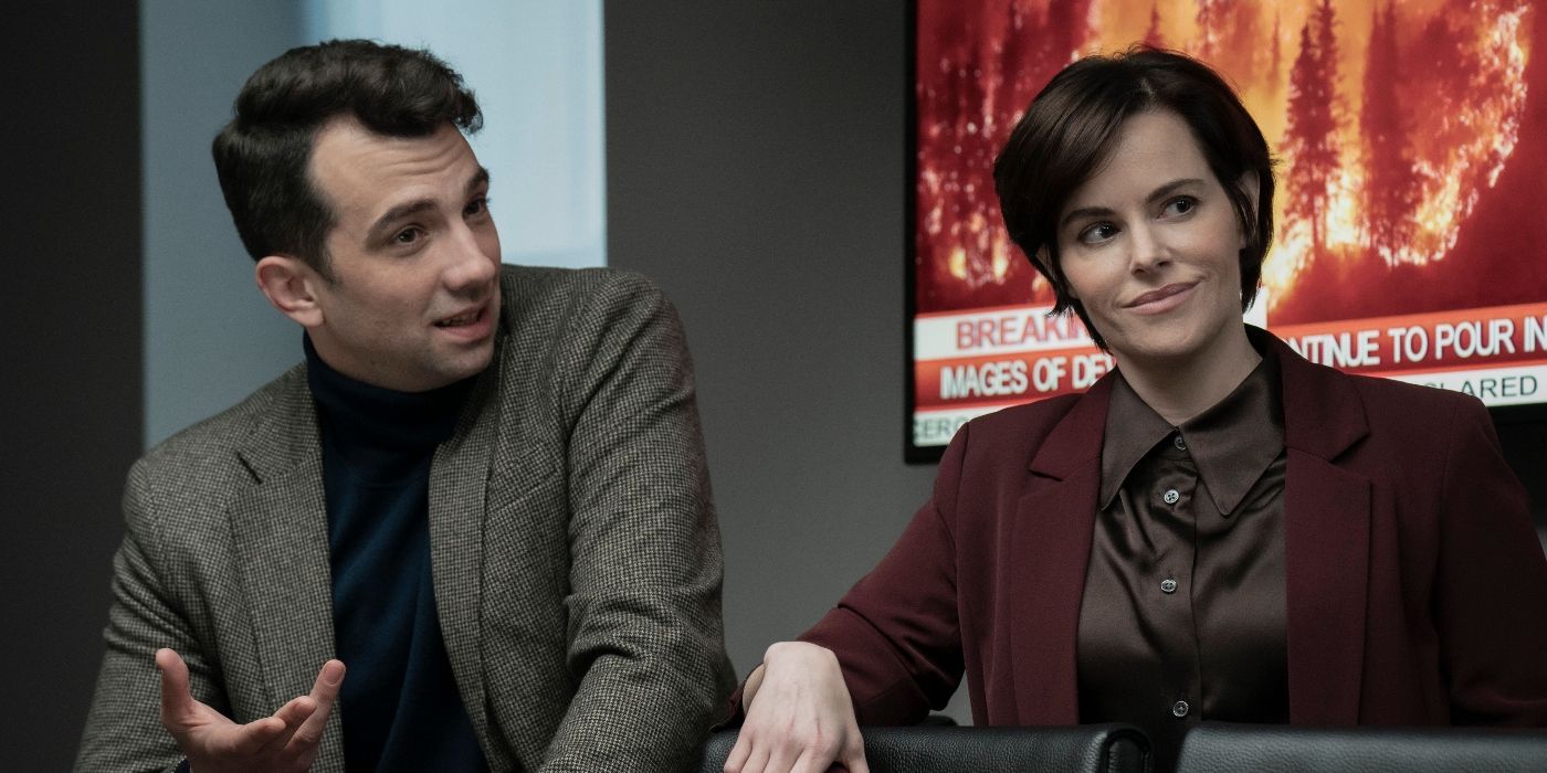 Jay Baruchel and Emily Hampshire as Jared and Rachel York, standing and smiling in Humane