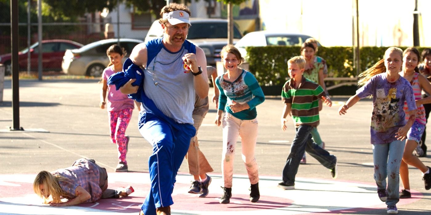Rainn Wilson as Wade running away from zombie children in Cooties