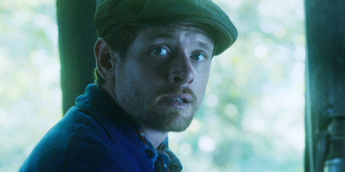 Jack O'Connell wearing a green hat in Lady Chatterly's Lover