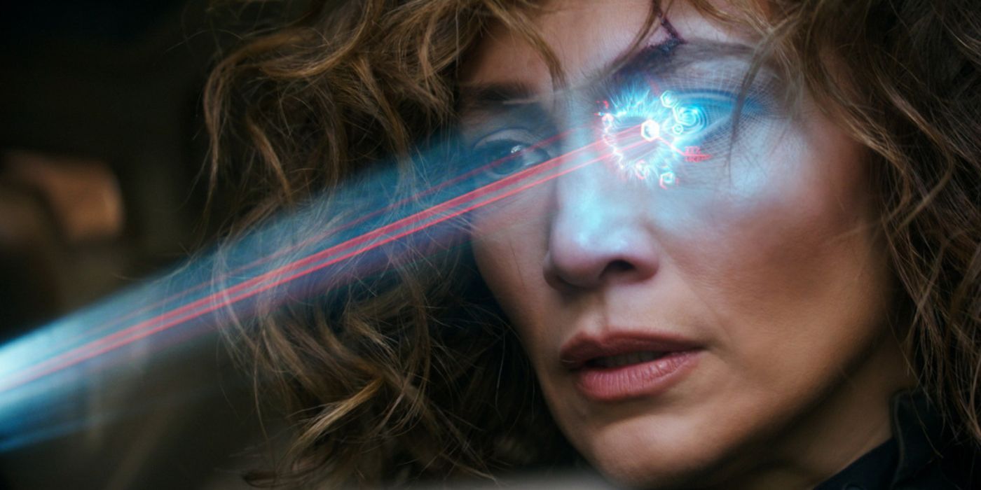 Jennifer Lopez has her eye scanned with a blue laser in Atlas.