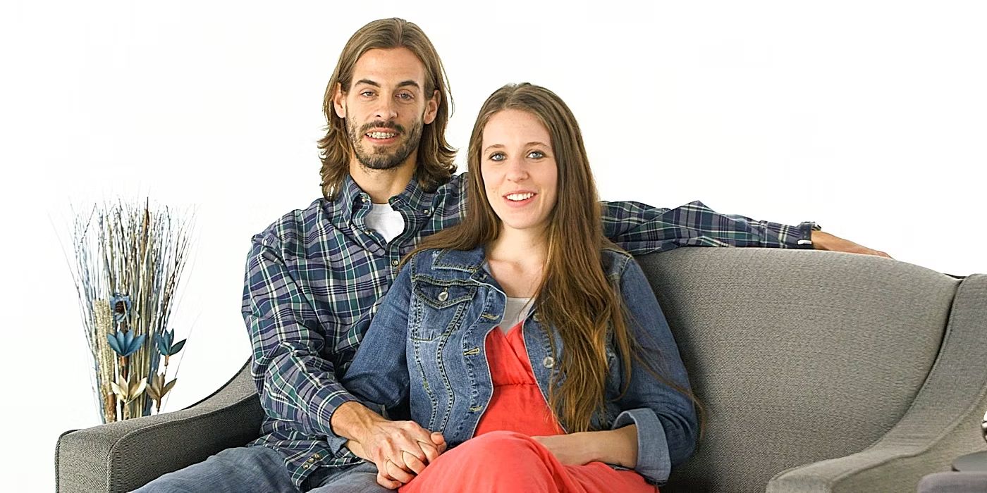 Jill Duggar and husband Derick Dillard sit on a couch in a still for TLC's Counting On