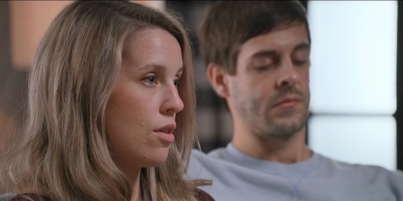 A close up of Jill Duggar Dillard with her husband next to her, doing an interview for 'Shiny Happy People'