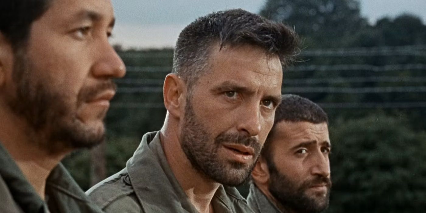 John Cassavetes as Victor R. Franko standing next to his fellow soldiers in 'The Dirty Dozen'