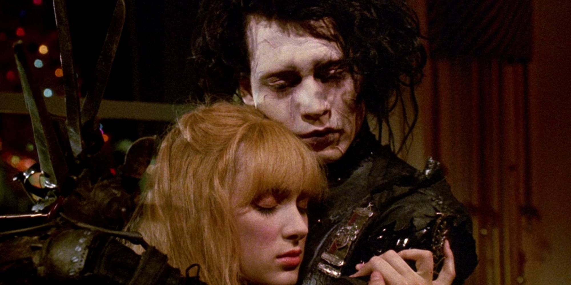 Johnny Depp and WInona Ryder as Kim and Edward in Edward Scissorhands hugging.