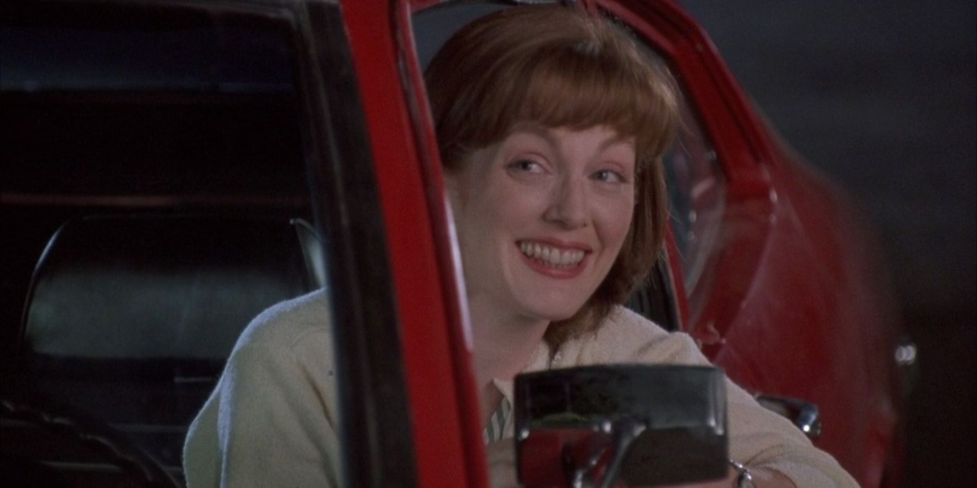 Ruthie smiling and looking out of a car window in Benny and Joon