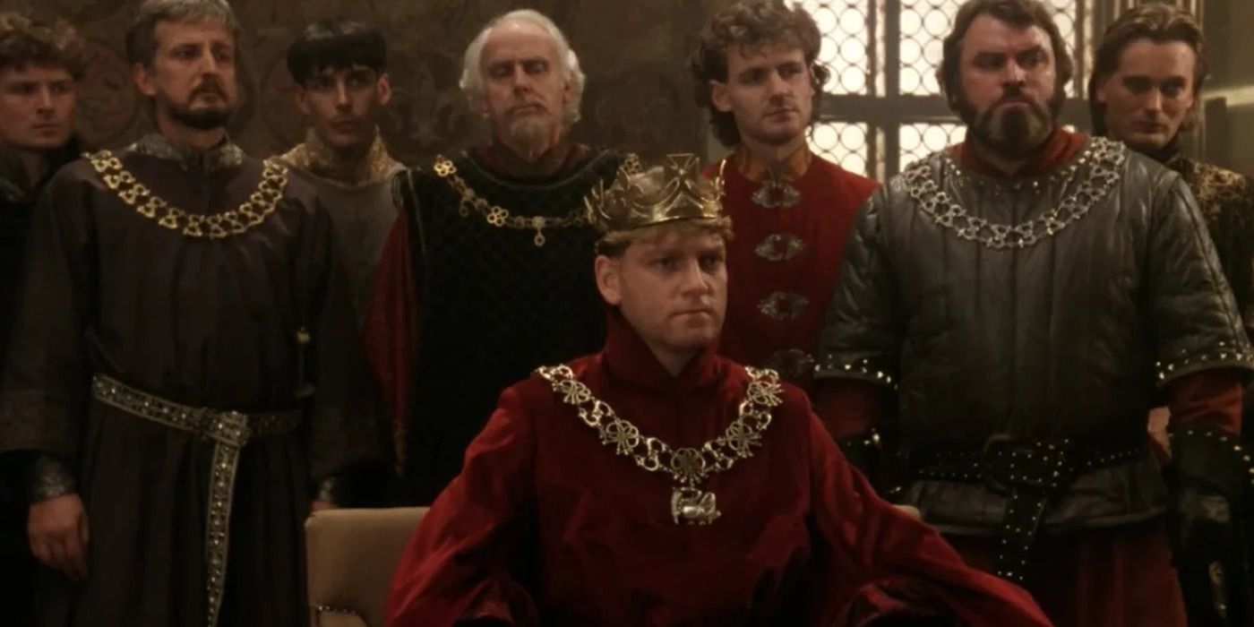 Kenneth Branagh as Henry V sitting in his throne, his court behind him, in &lsquo;Henry V&rsquo;