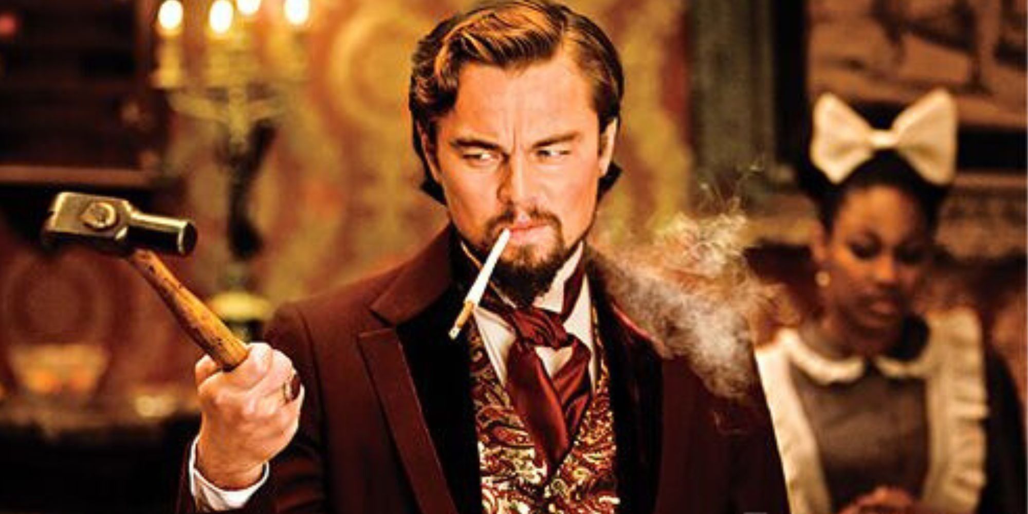 Calvin Candie, holding a hammer and smoking a cigarette, in Django Unchained.