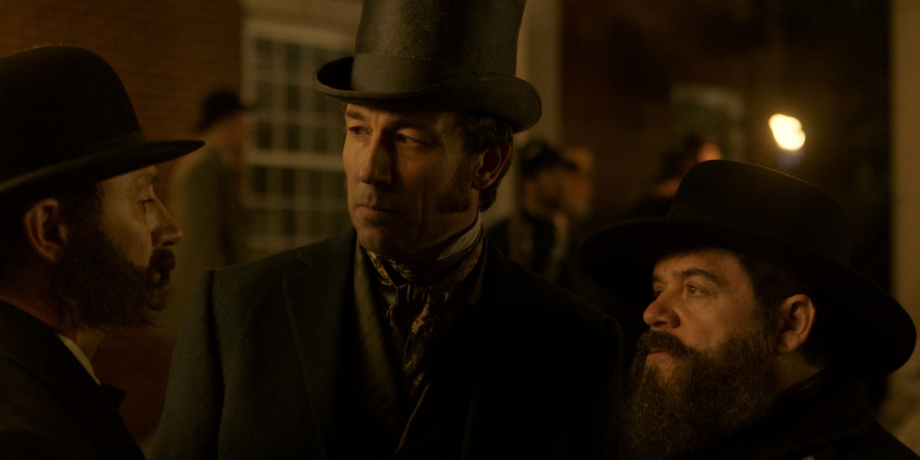 Patton Oswalt as Detective Lafayette Baker standing next to Tobias Menzies in Episode 7 of Manhunt
