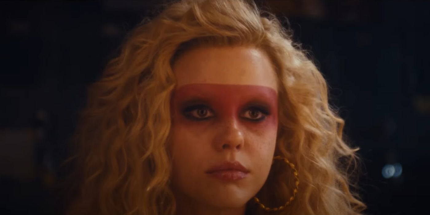 Mia Goth as Maxine Minx, with pink eye makeup on Maxxine.