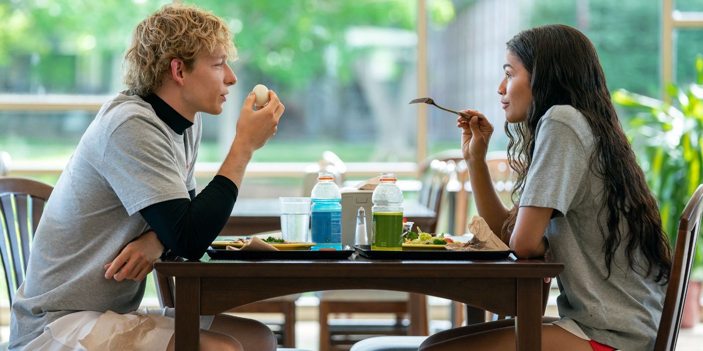 Mike Faist as Art and Zendaya as Tashi, eating breakfast in Challengers.