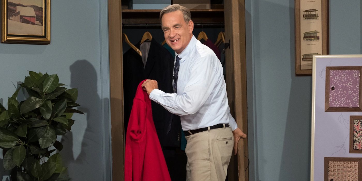 Mister Rogers (Tom Hanks) hanging up his iconic red sweater in 'A Beautiful Day in the Neighborhood'