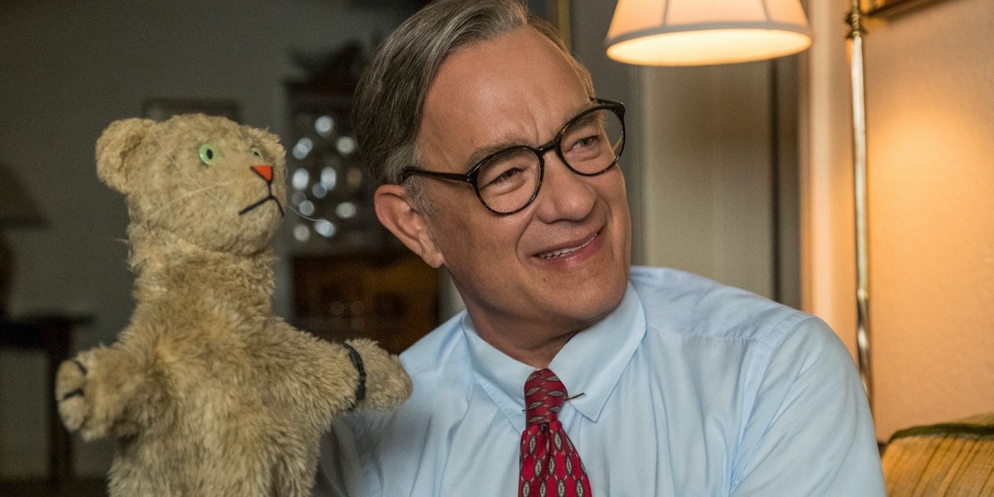 Fred Rogers (Tom Hanks) with his puppet, Daniel the Tiger, in 'A Beautiful Day in the Neighborhood'