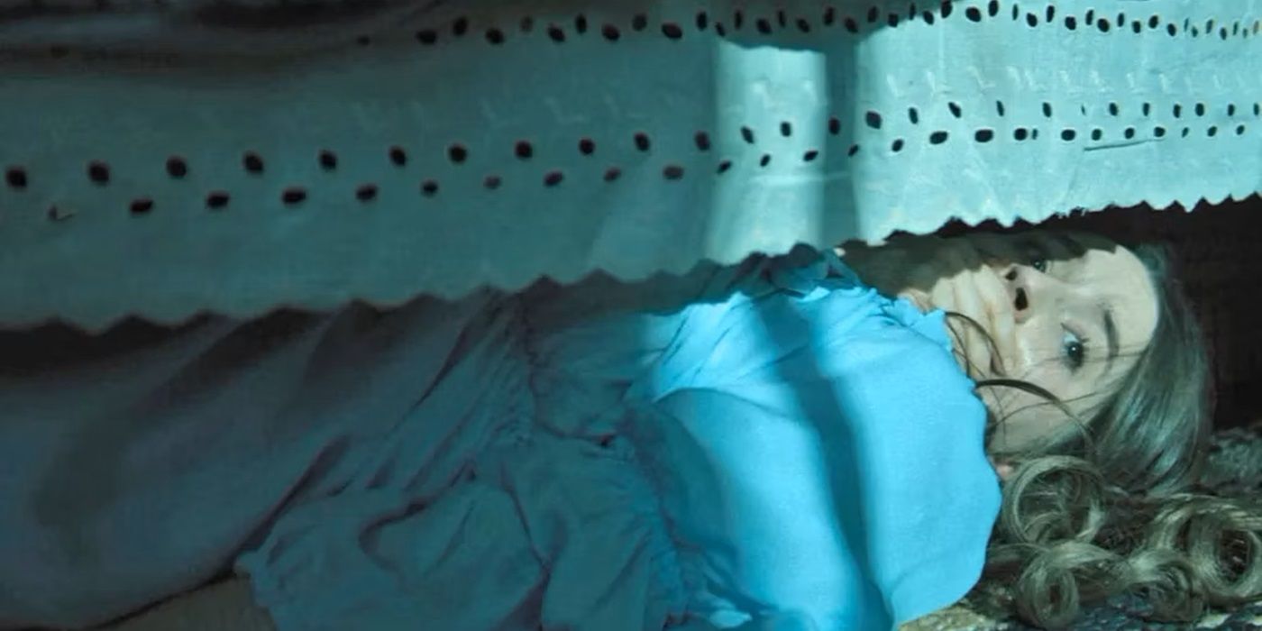 Brynn hiding under her bed in No One Will Save You