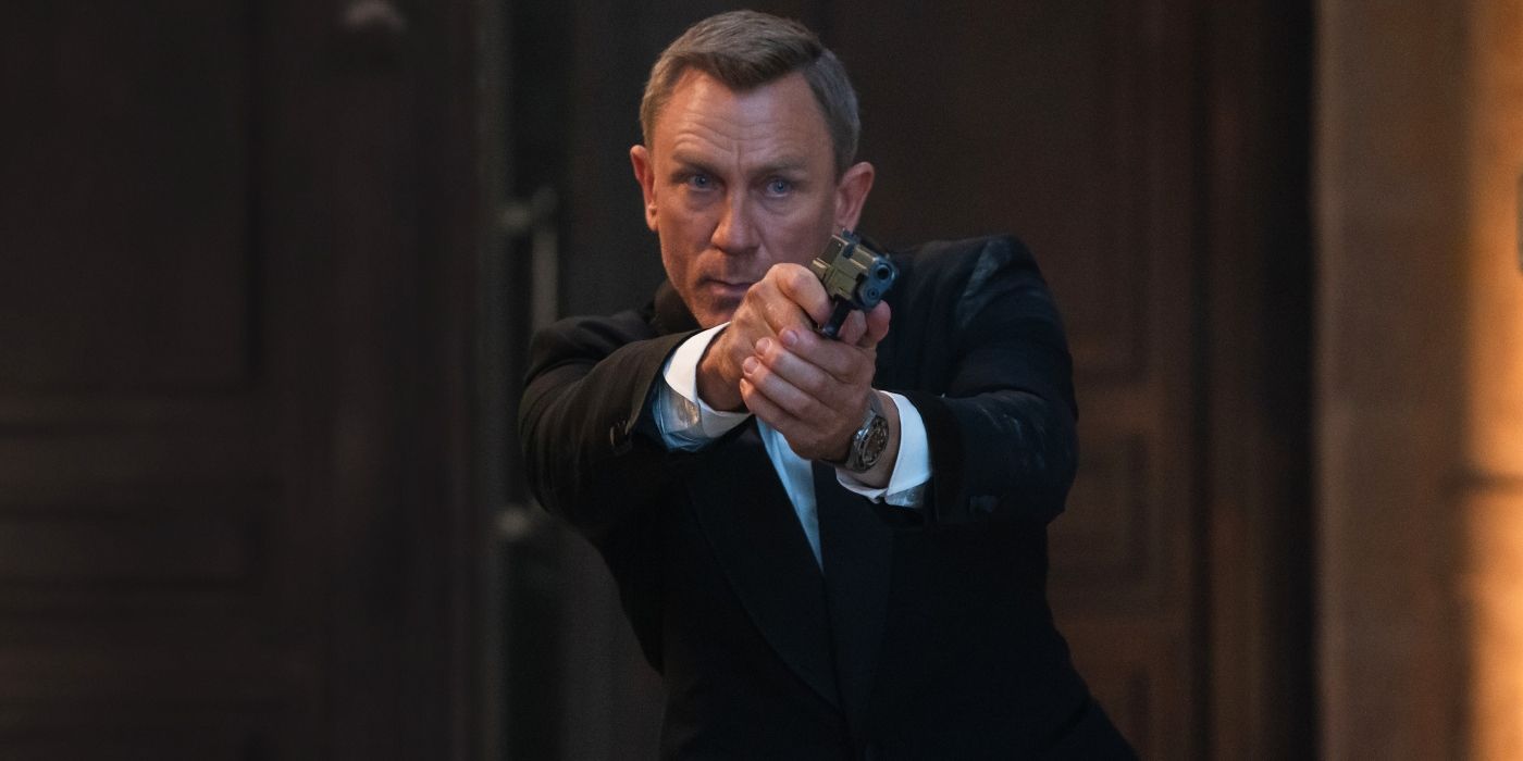 James Bond holding a gun in No Time to Die