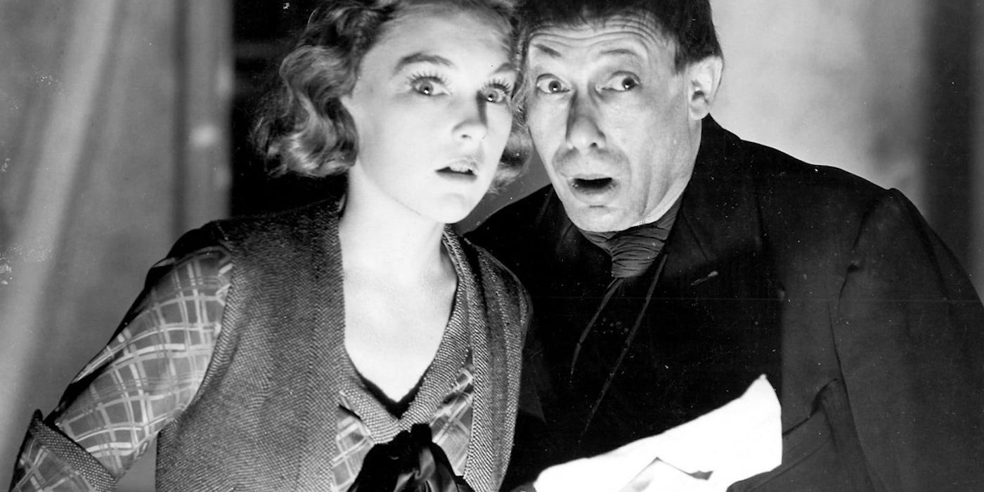 A man and a woman with their mouths open in shock in the film Number Seventeen