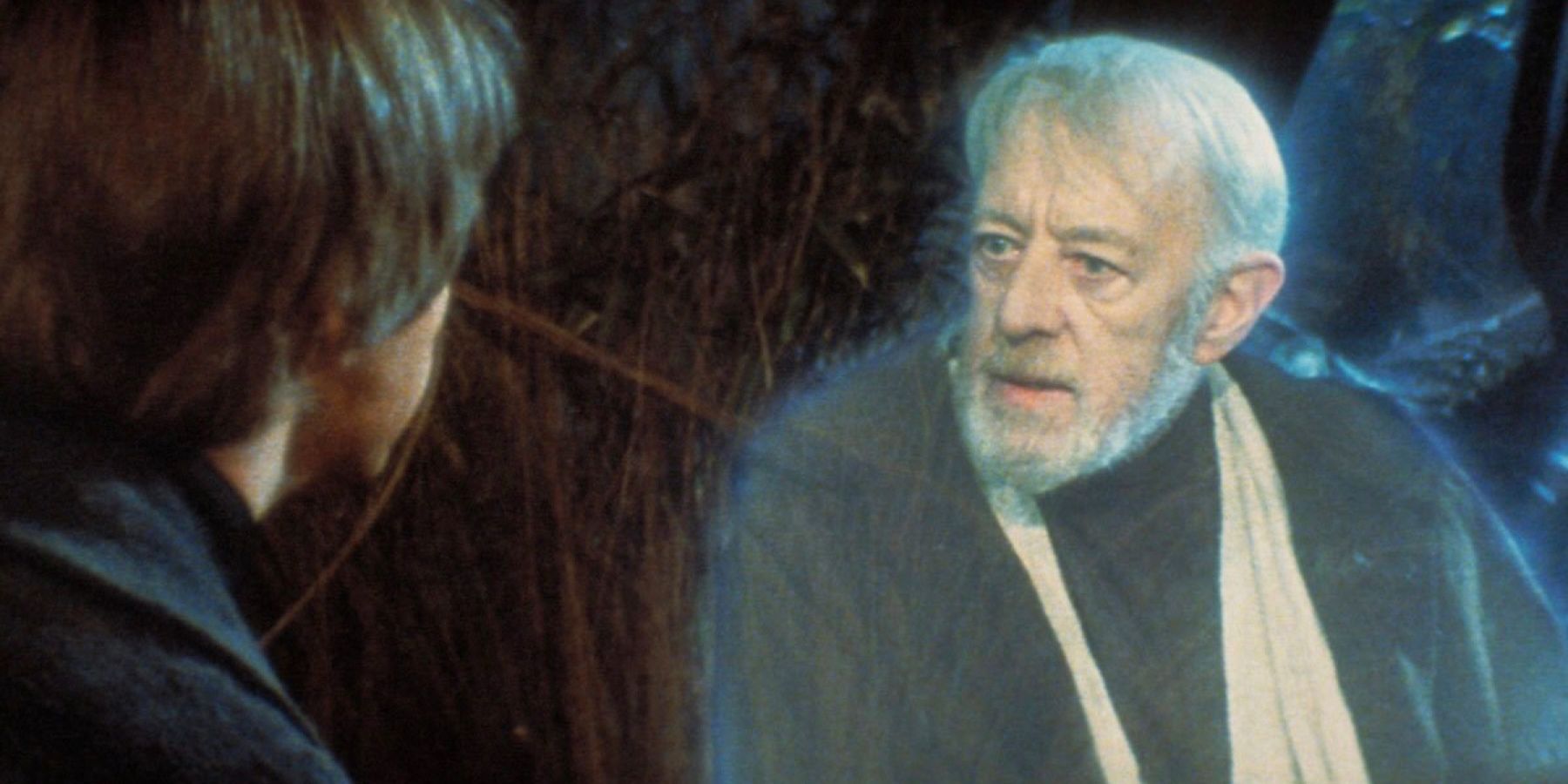 The glowing spirit of Obi-Wan "Old Ben" Kenobi, played by Actor Alec Guinness, gives advice to Luke Skywalker on Dagobah in 'Return of the Jedi'