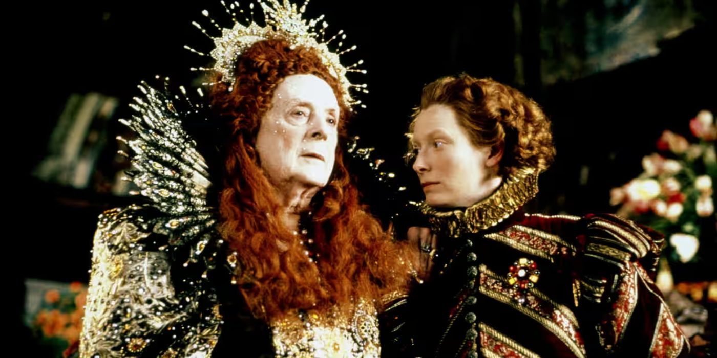 Queen Elizabeth I (Quentin Crisp ) speaks privately with Orlando (Tilda Swinton)