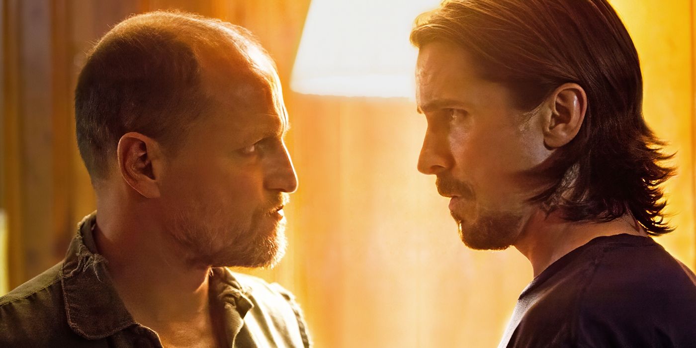 Woody Harrelson and Christian Bale staring each other down in Out of the Furnace