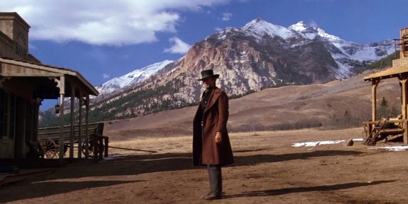 The Preacher (Clint Eastwood) stands in the midst of town waiting to draw in 'Pale Rider.'