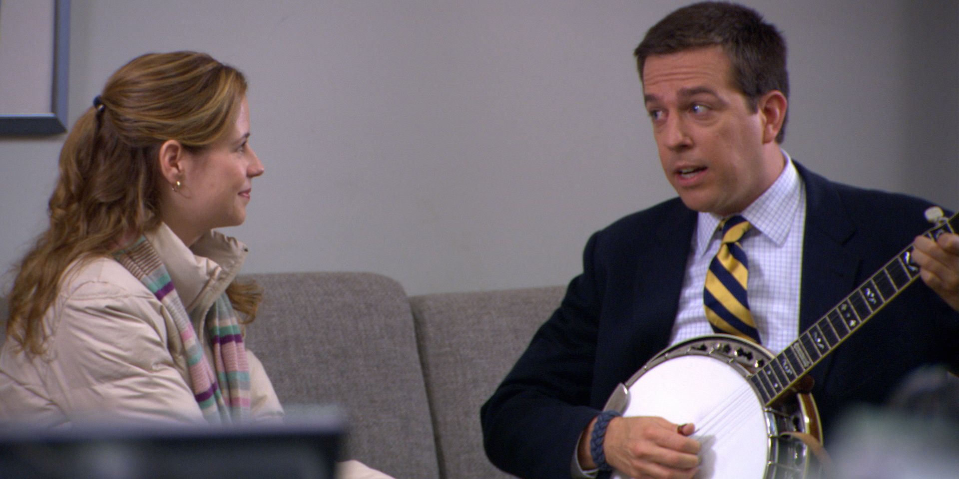 Ed Helms as Andy plays the banjo for Jenna Fischer as Pam in The Office episode The Convict