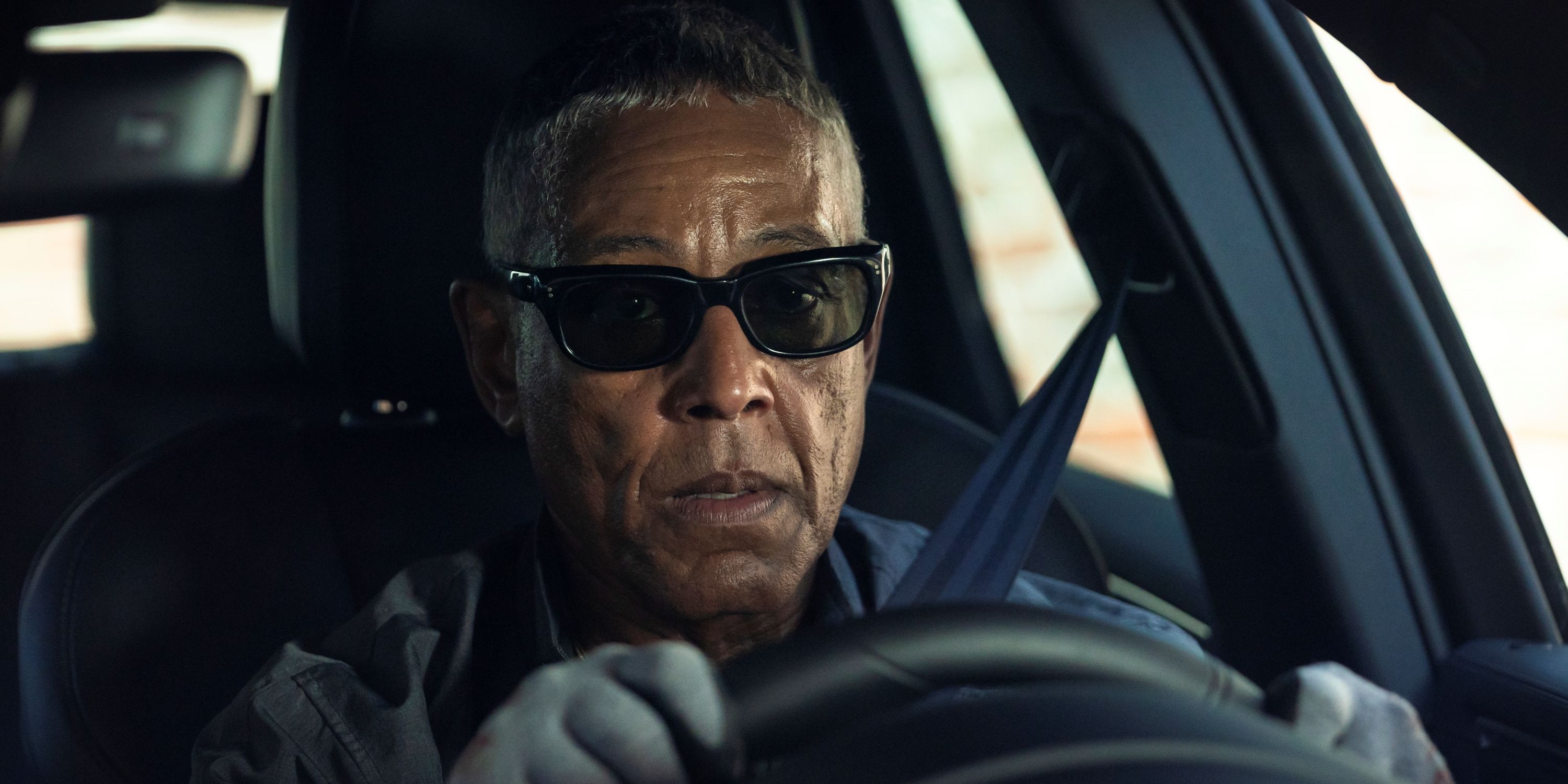Giancarlo Esposito as Gray Parish driving a car while wearing sunglasses in Episode 1 of Season 1 of Parish