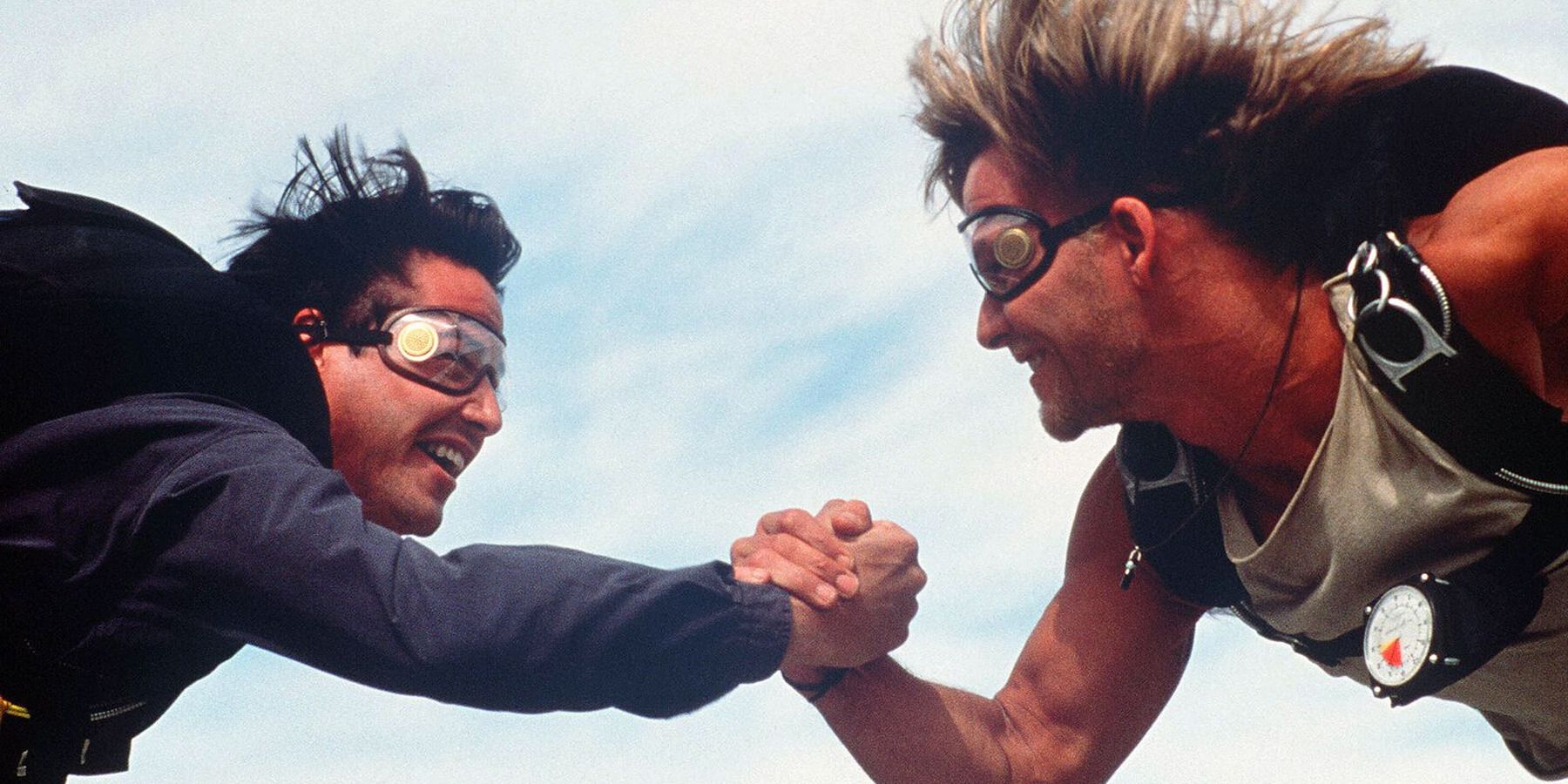 Bodhi and Johnny skydiving in 'Point Break', holding hands