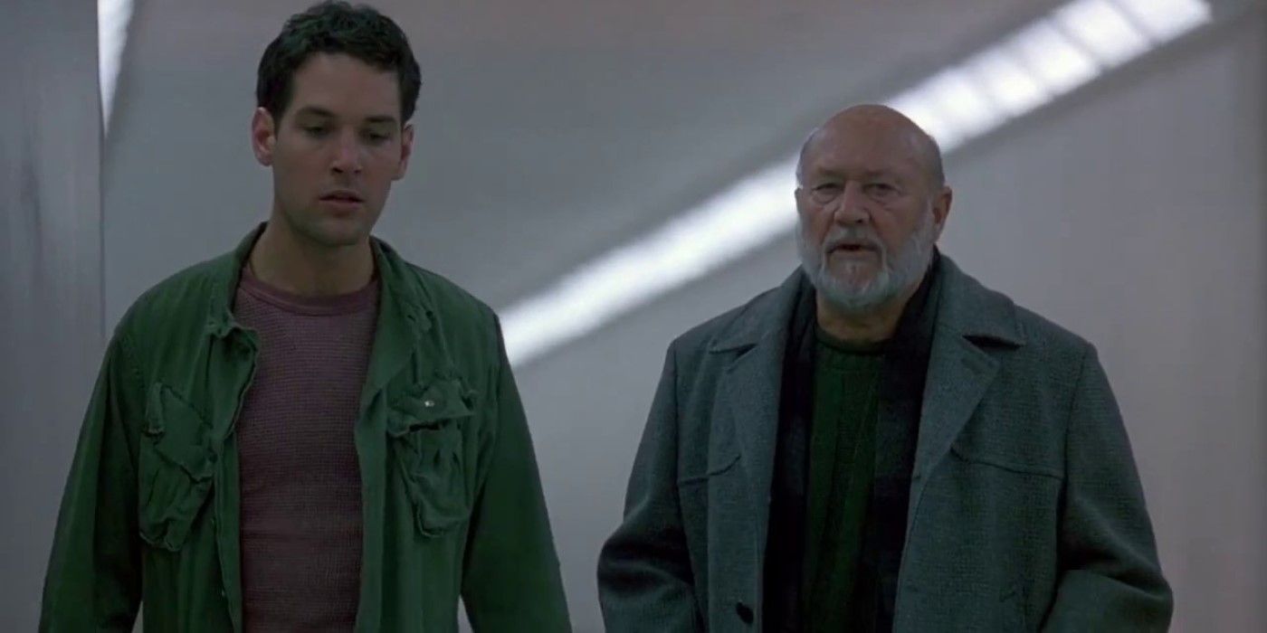 Tommy Doyle and Dr. Loomis stand in a hallway in 'Halloween: The Curse of Michael Myers'