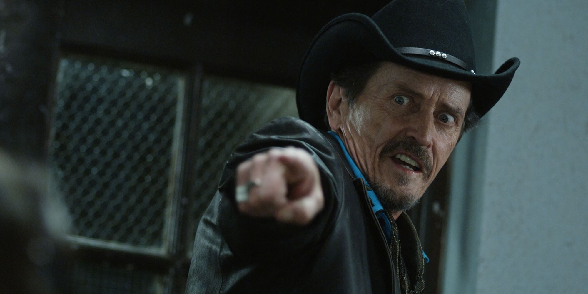 A still from Pontypool featuring Stephen McHattie as Grant Mazzy pointing at the camera