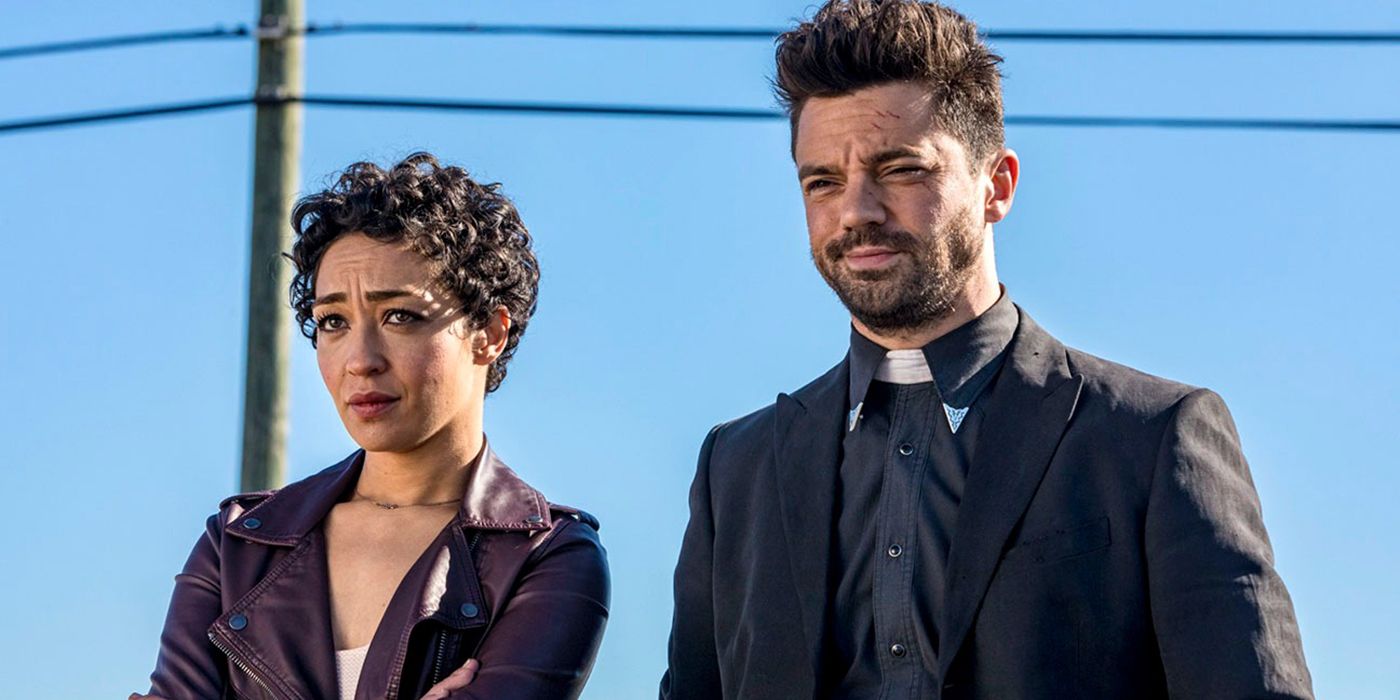 A man with a priest's collar standing with a woman outside in a scene from Preacher.