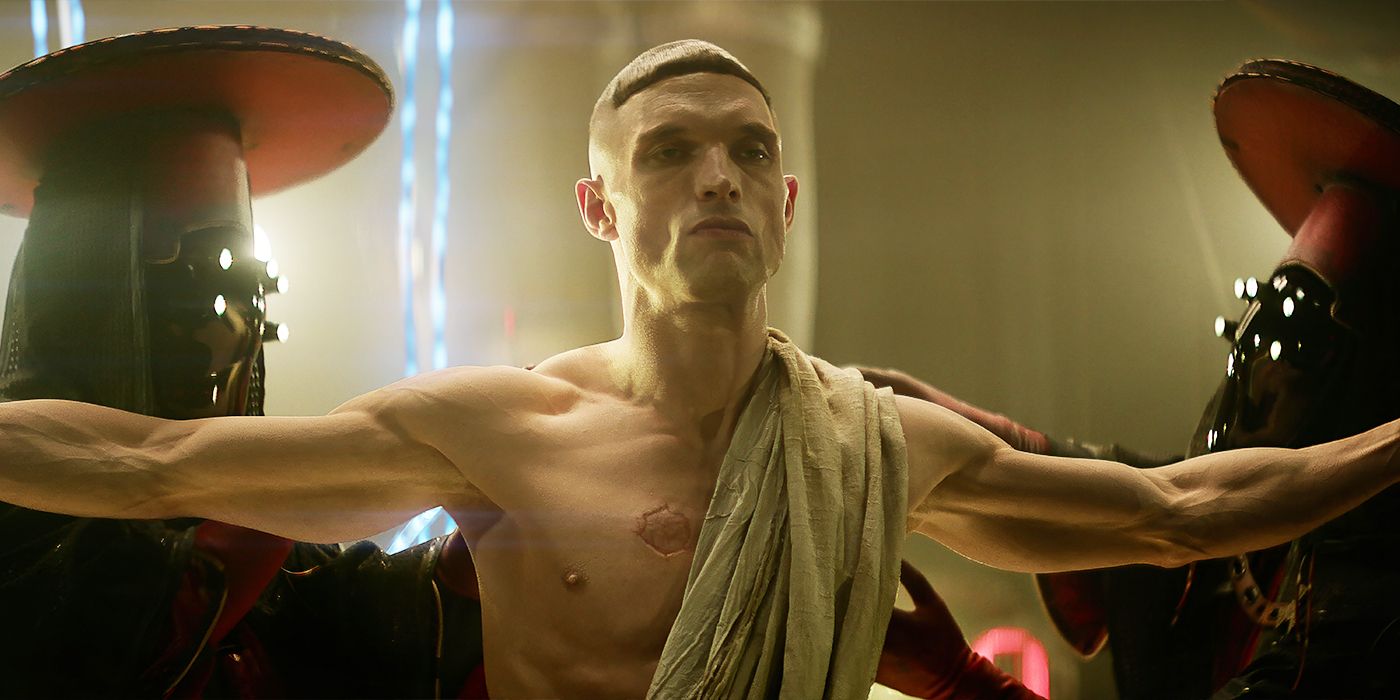 Ed Skrein as Atticus Noble being inspected after getting resurrected in Rebel Moon - Part Two: The Scargiver. 