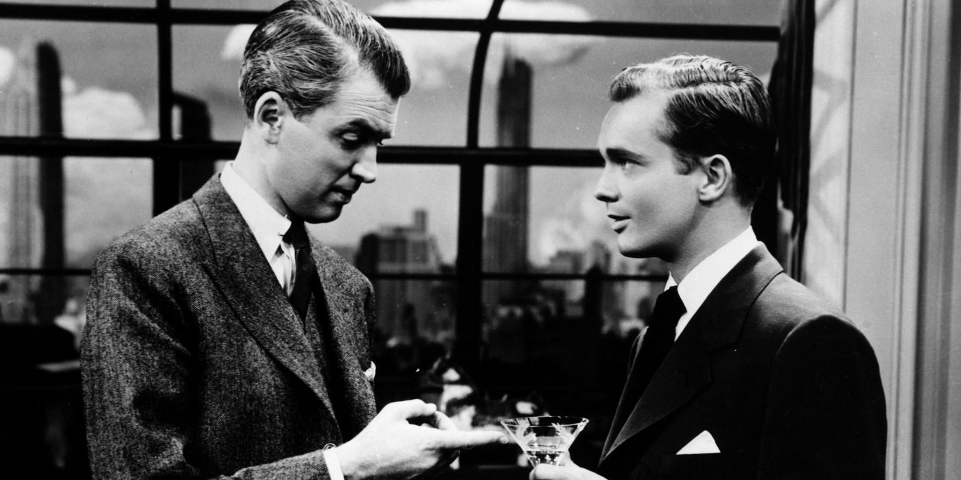 Jimmy Stewart looking skeptical of Douglas Dick in Rope