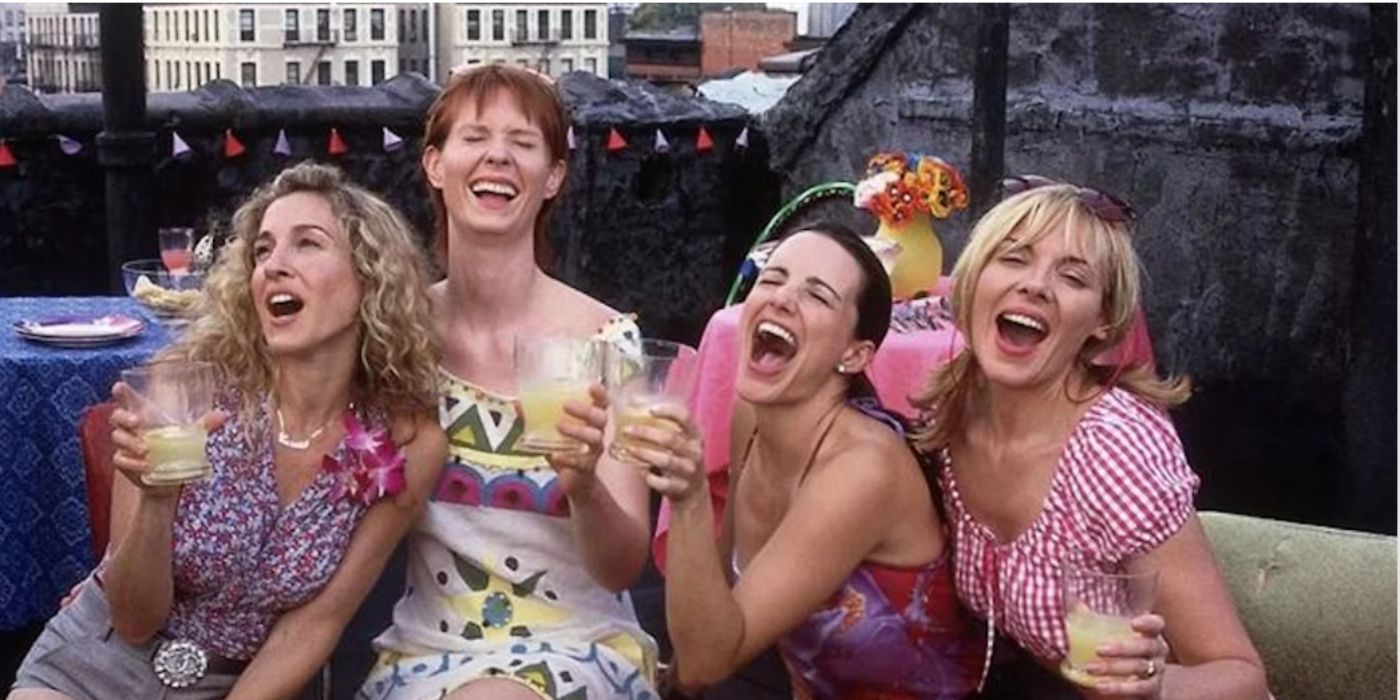 Sarah Jessica Parker, Cynthia Nixon, Kristin Davis, Kim Cattrall as Carrie, Miranda, Charlotte and Samantha at a rooftop party in 'Sex and the City'