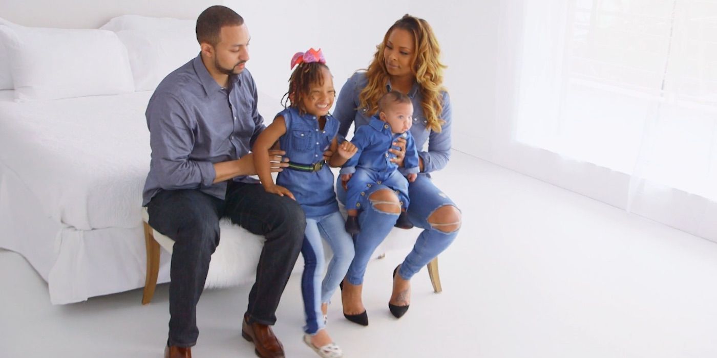 Eva Marcille and her young family pose for a photo on 'Real Housewives Of Atlanta'