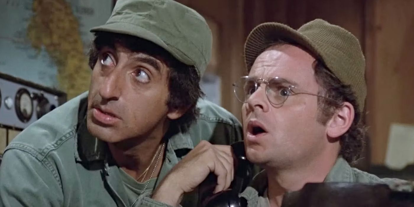 Jamie Farr and Gary Burghoff as Klinger and Radar, looking shocked in an episode of M*A*S*H