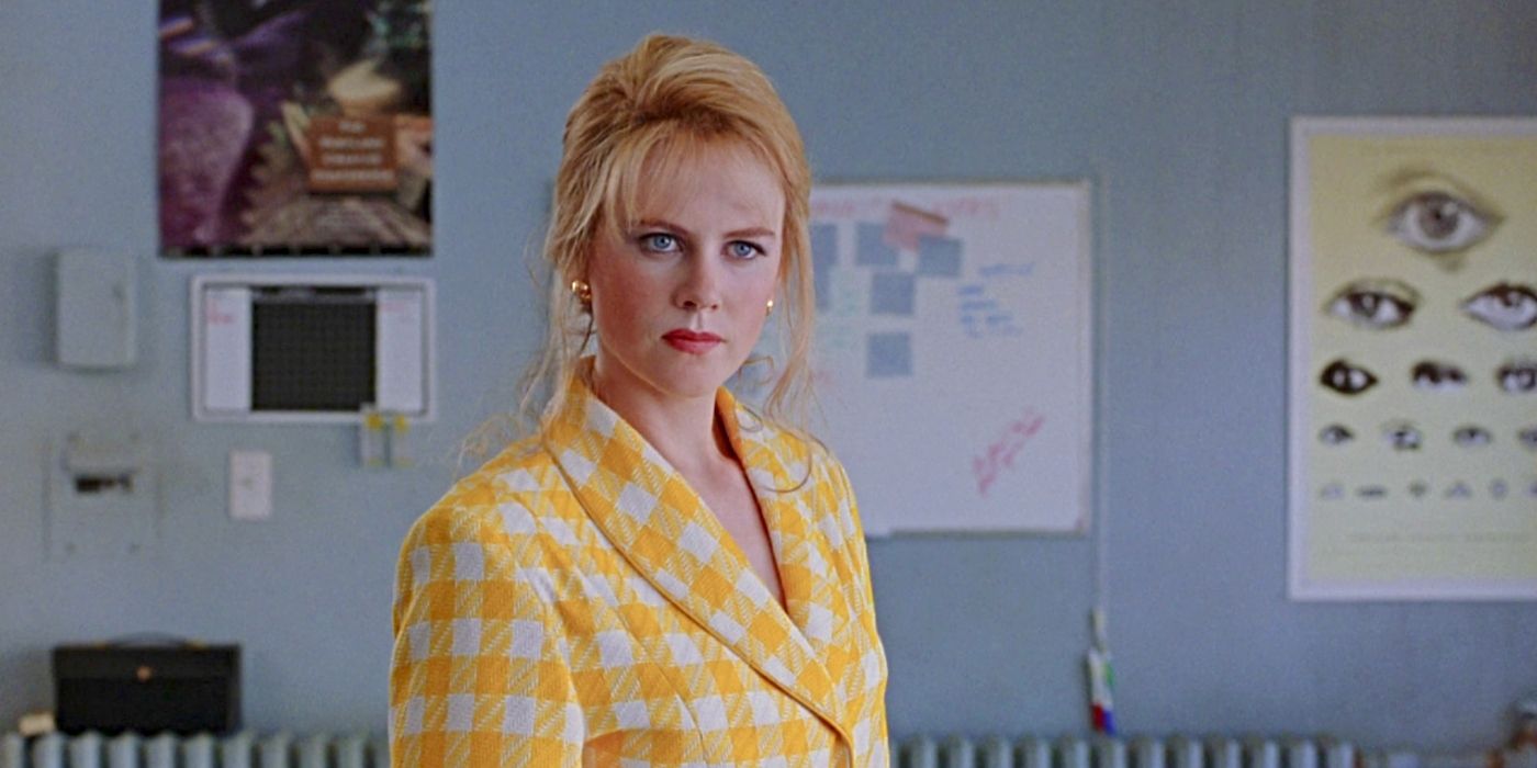 Nicole Kidman as Suzanne Stone, wearing a checkered yellow suit and scowling in To Die For