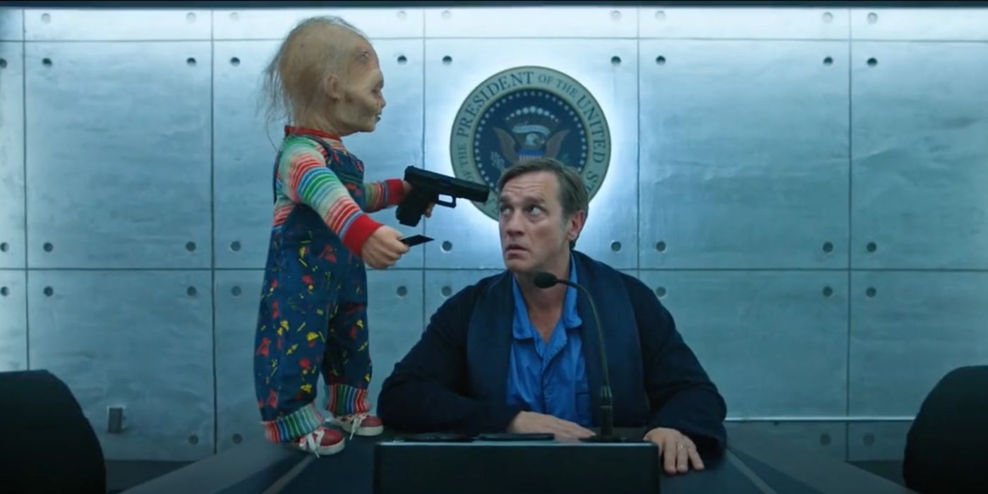 Randall (Devon Sawa) is the President's double and Chucky points a gun to his head in Chucky Season 3.