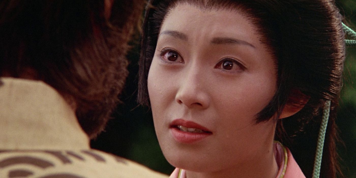 A close-up of Mariko (Yoko Shimada) staring slightly to the left and into an offscreen Blackthorne's eyes with a pleading expression in the 1980 Shogun