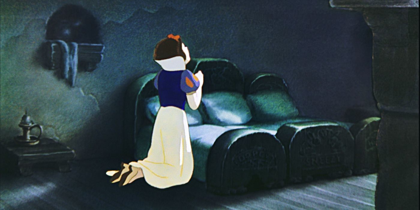 Snow White praying before bed in the dwarf&rsquo;s cottage
