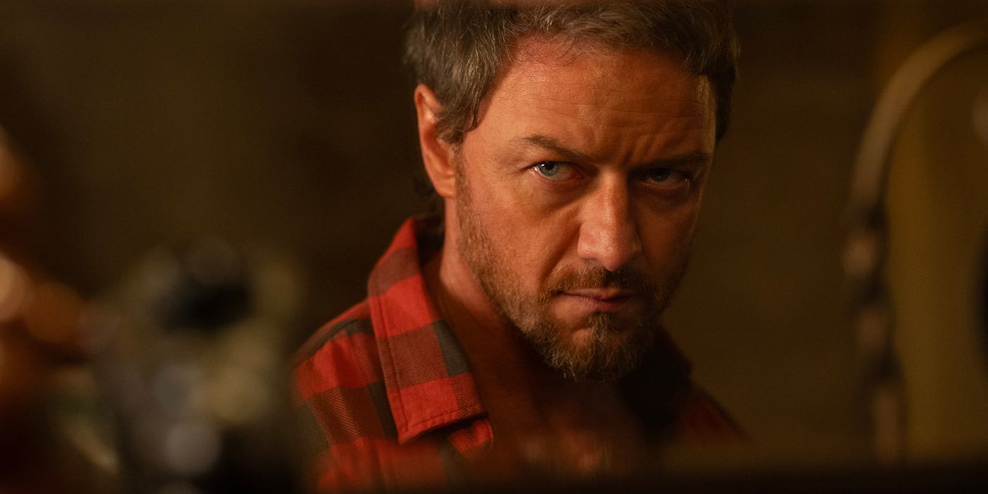 James McAvoy in red plaid frowning at something in Speak No Evil 