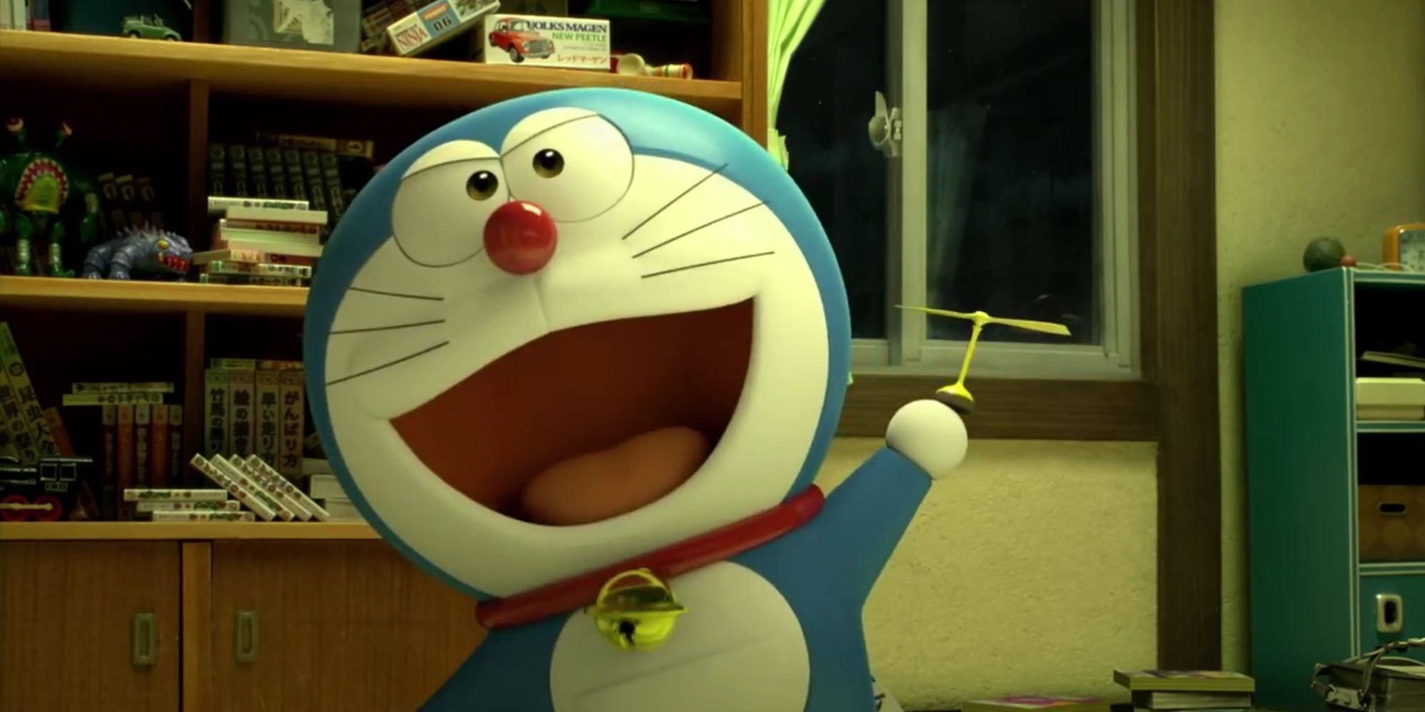 Doraemon talking and holding an object in the film Stand by Me Doraemon.