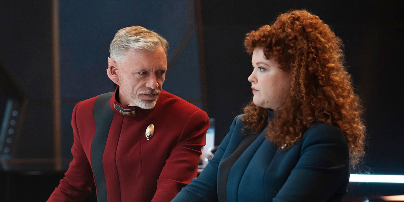 Callum Keith Rennie sitting at a bar with Mary Wiseman in Star Trek Discovery